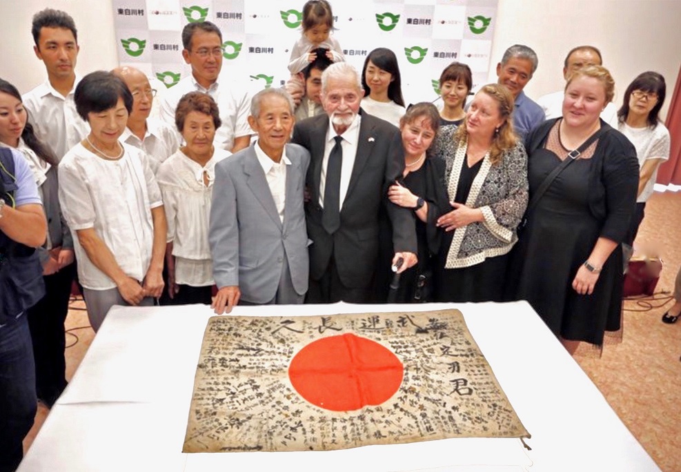 American and Japanese families at the returning ceremony.